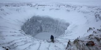 A 100-foot-wide permafrost crater in Siberia's Yamal Peninsula.Photo: Vladimir Pushkarev / Russian Centre of Arctic Exploration