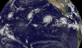 Hurricanes Kilo, Ignacio and Jimena churn in the northeast Pacific Ocean. Image: NASA