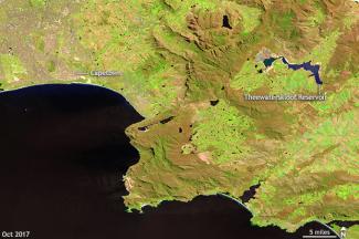 Three years of below-average rain has had a big impact on reservoirs around Cape Town, South Africa. Water levels in the Theewaterskloof reservoir have drastically fallen. Image: USGS GloVis.