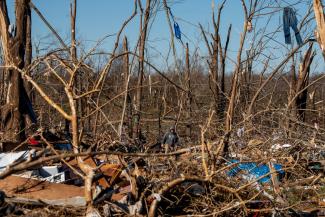 Residents and volunteers continued to sift through debris in Mayfield, Ky. (Credit...Johnny Milano for The New York Times)