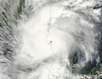 MODIS satellite image of Otto taken at approximately 11 am EST, November 24, 2016--Thanksgiving Day. At the time, Otto was a Category 2 storm with 110 mph winds about to make landfall in Nicaragua as the strongest Atlantic hurricane ever observed so late in the year. Image: NASA