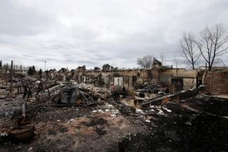 Burned out homes are pictured in the Abasand neighbourhood of Fort McMurray, Alberta, Canada, May 9, 2016 after wildfires forced the evacuation of the town. Photo: Chris Wattie, Reuters