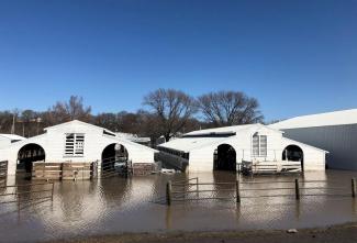 File photo: Paddocks at Washington County Fairgrounds are shown underwater due to flooding in Arlington, Nebraska, U.S., March 21, 2019. Photo: Humeyra Pamuk, Reuters