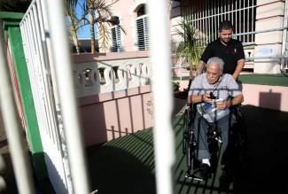 Nicky Sanchez Quiles, 71, a resident of the San Rafael nursing home and a dialysis patient, is taken to a hospital in Arecibo, Puerto Rico February 14, 2018. Photo: Alvin Baez, Reuters